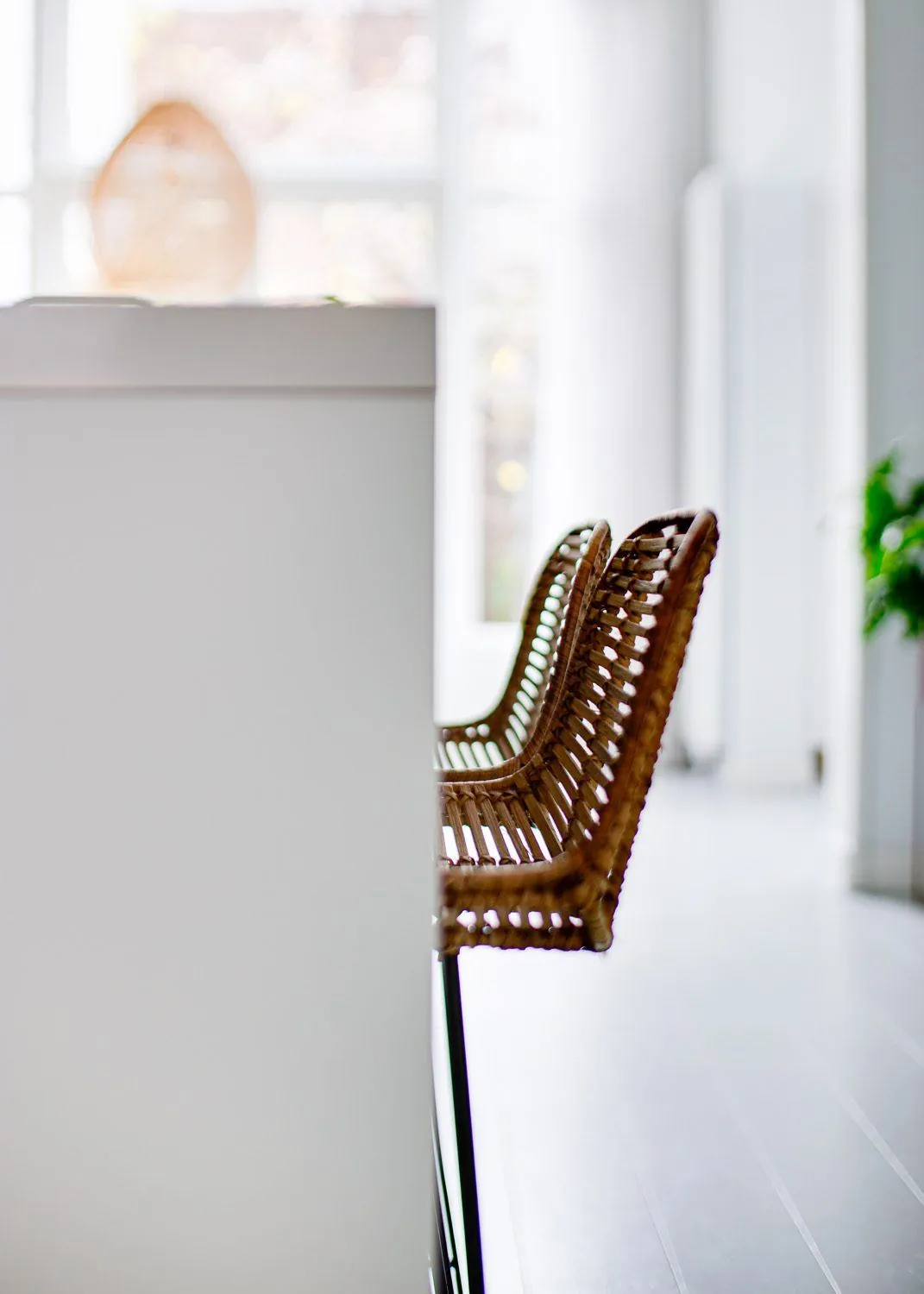 Rattan stool at the island