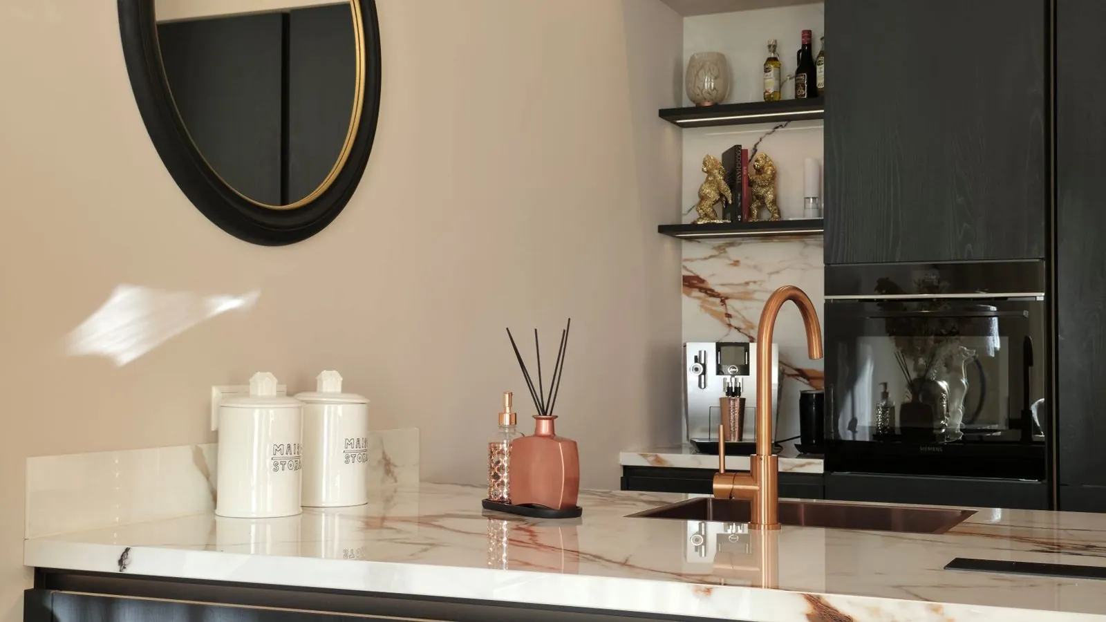 Detail of the ceramic worktop and the copper tap